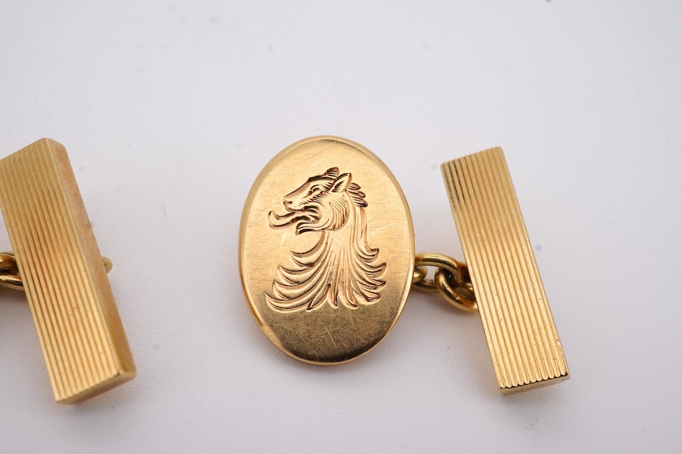 A pair of Elizabeth II 18ct gold oval cufflinks, engraved with lion's head crest, S.J. Rose & Son, Birmingham, 1973, 22 grams. Condition - fair